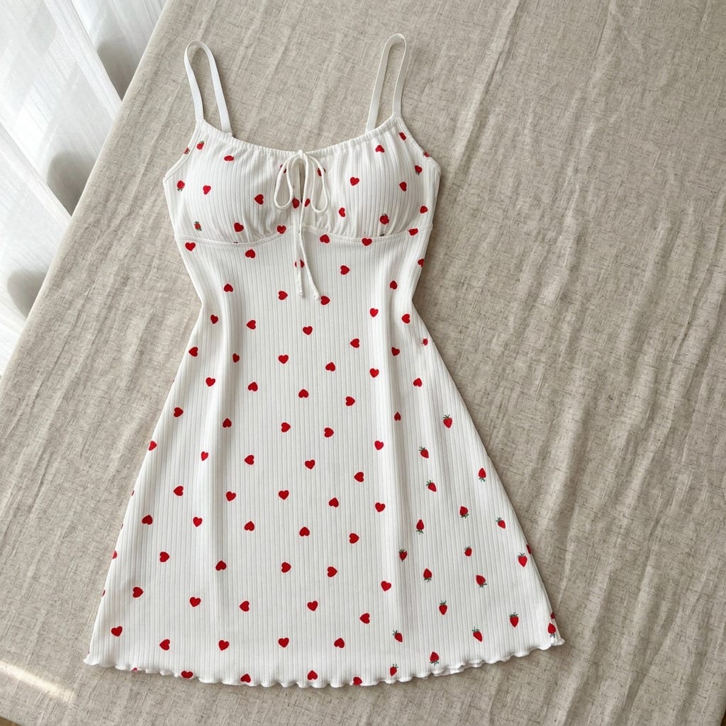 The Viola Ribbed Nightgown, laid flat on linen